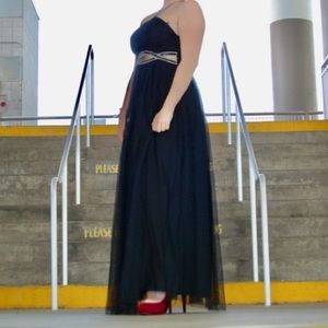 Long formal black dress with glittery top.